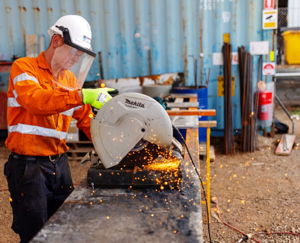 Simmons Civil worker using a mitre saw